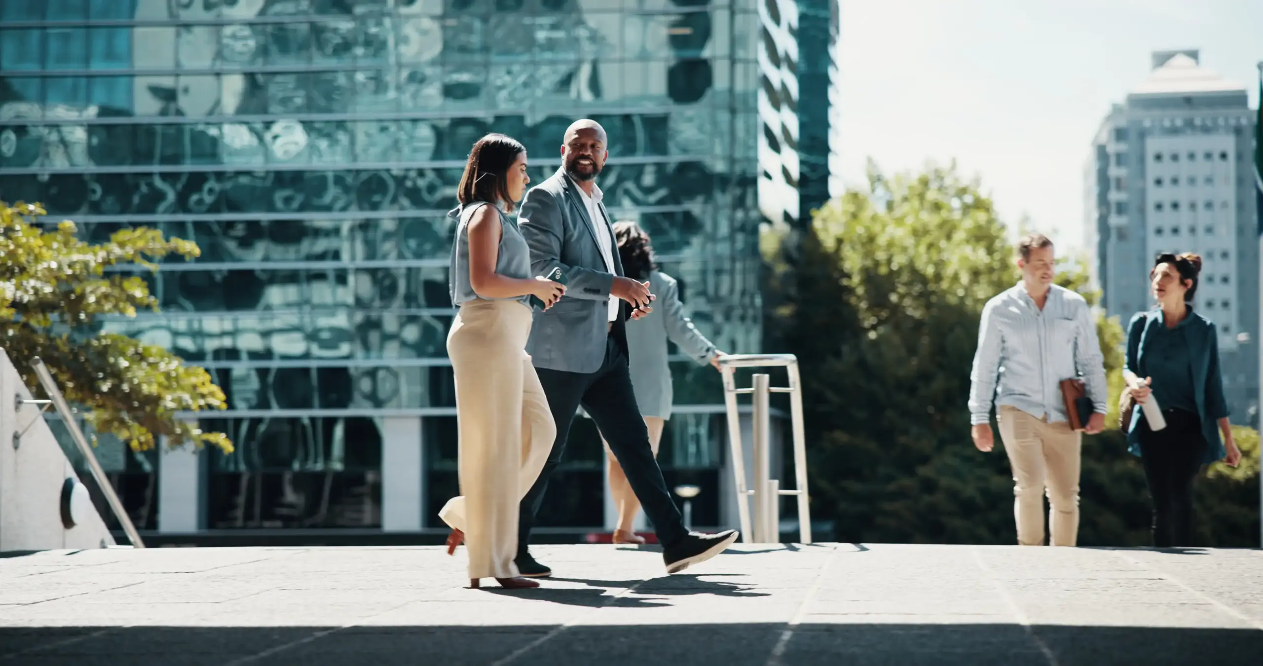 Team Walking in City
