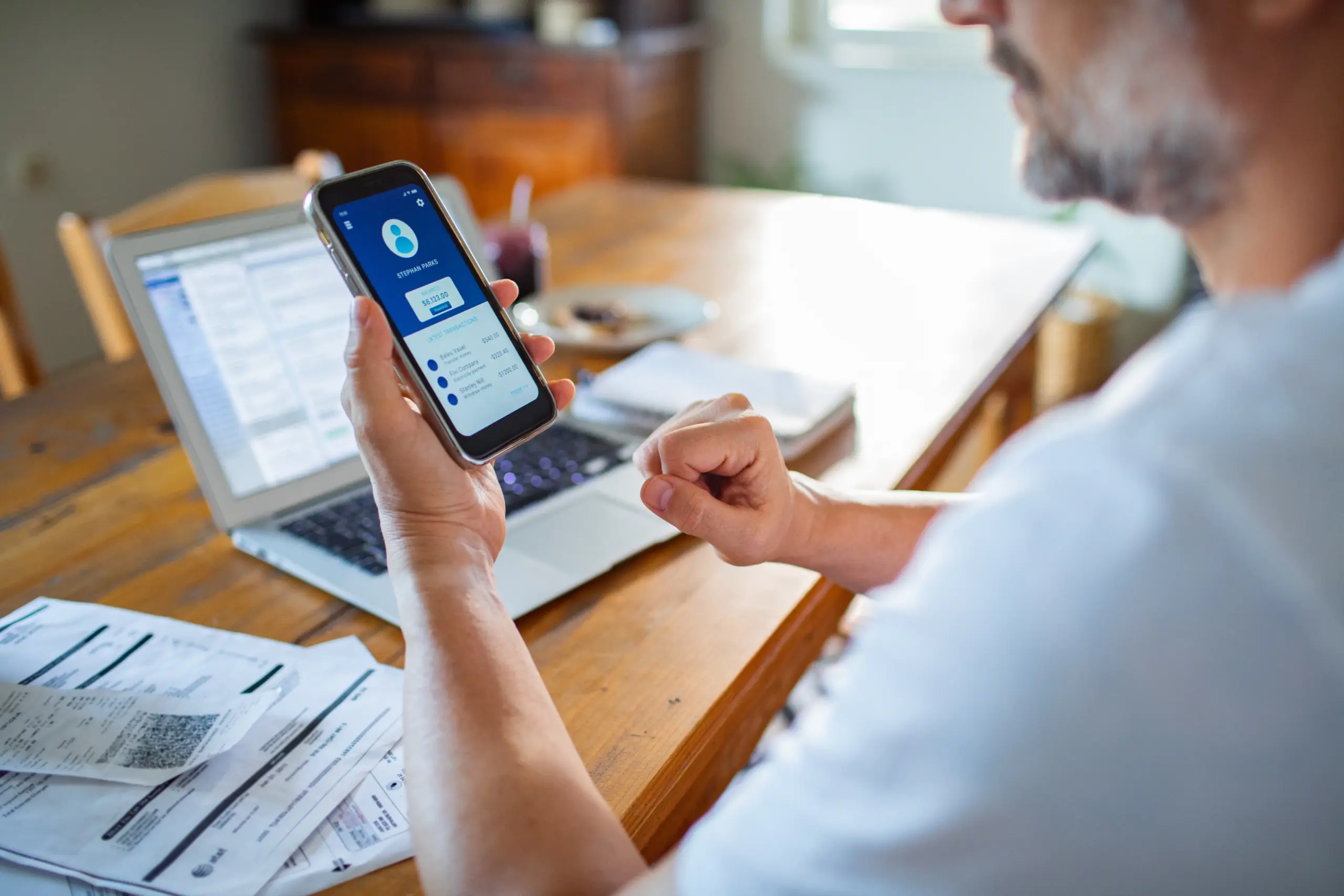 Man online banking at home