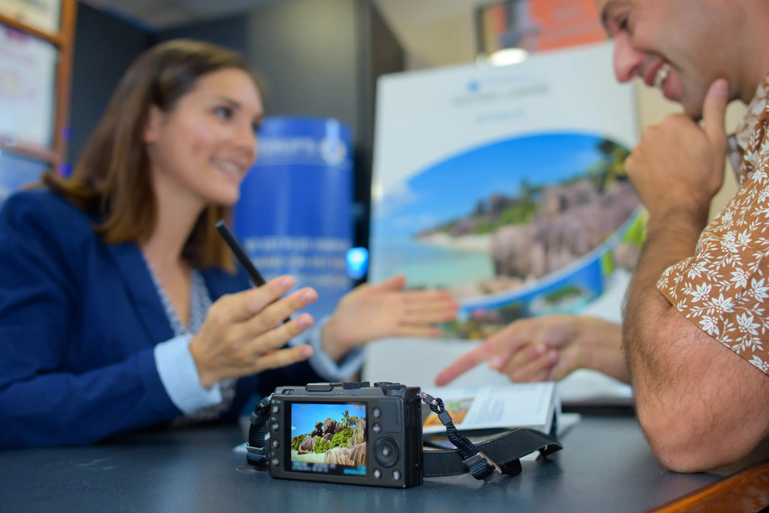 Travel agent or tour operator with camera